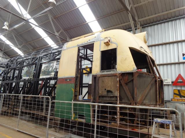 Jolly Swagman Caravan Park - Toowoomba: Old rail car being rebuilt in the main shed. Volunteers do all the work.