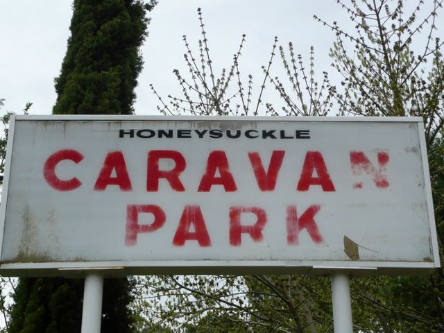 Honeysuckle Caravan Village - Violet Town: Honeysuckle Caravan Park welcome sign