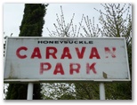 Honeysuckle Caravan Village - Violet Town: Honeysuckle Caravan Park welcome sign