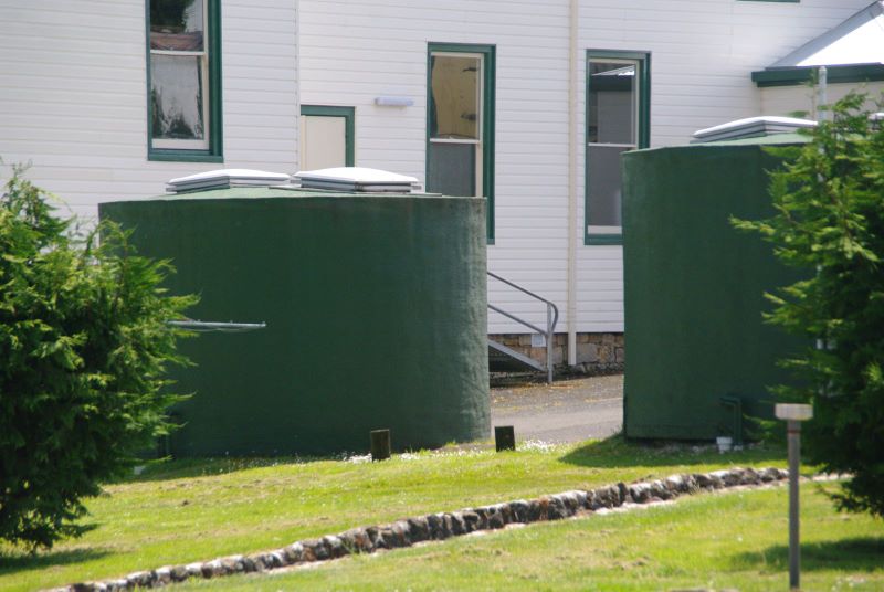 Waratah Caravan Park and Camping Ground - Waratah: Water tanks are the amenities.  Each tank contains a shower, toilet and hand basin. The laundry is free