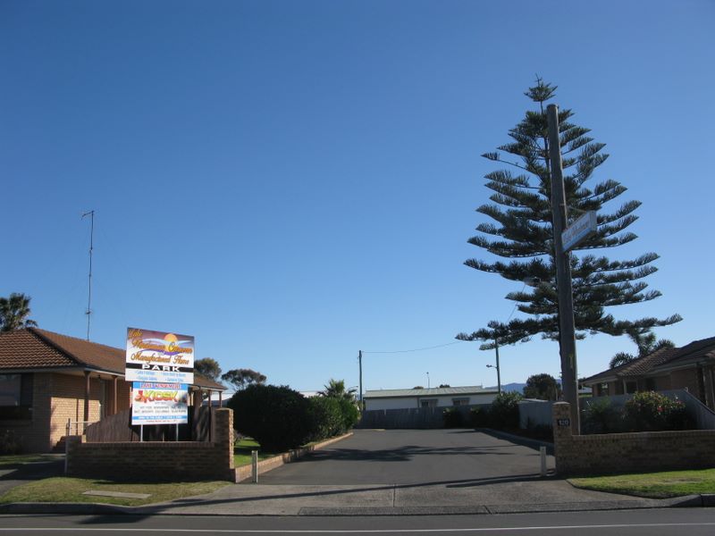 Lake Windemere Caravan and Manufactured Home Park - Warilla: View of the park from the road.