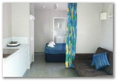 Weipa Camping Ground and Caravan Park - Weipa: Interior of cabin