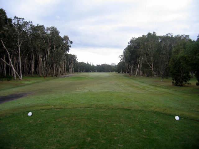 Yamba Golf Course - Yamba: Fairway view of the 18th with town water tower in the distance.