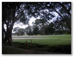 Yamba Golf Course - Yamba: 13th green with long bunkers.