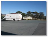 Yass Roadhouse and Service Centre - Yass: Caravan mixing it with a truck.